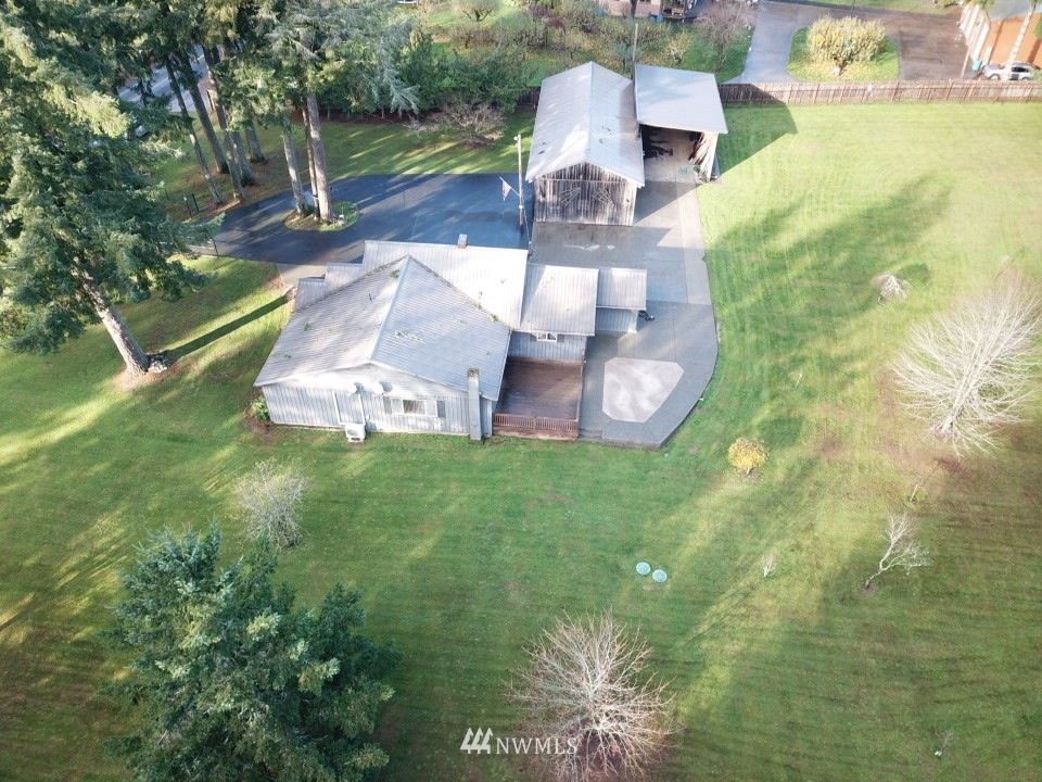 106 Pattee Road Chehalis, WA 98532 - Photo 30 of 33 a view of a house with a yard