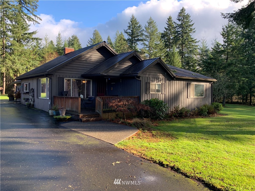 106 Pattee Road Chehalis, WA 98532 - Photo 3 of 33 a view of a house with backyard and sitting area