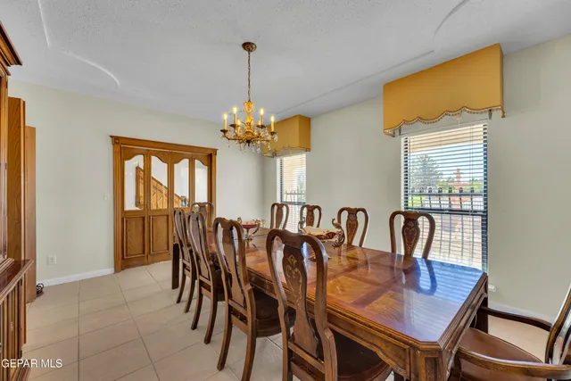 a kitchen with stainless steel appliances granite countertop a refrigerator and cabinets