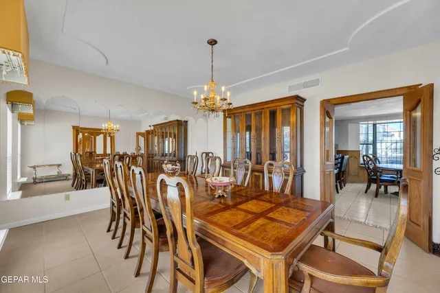 a living room with a fireplace and a fireplace