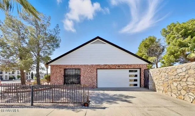 a view of a door and a window