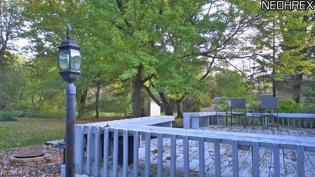 4869 Lander Road Chagrin Falls, OH 44022 - Photo 23 of 25 Back yard is huge! Lovely big deck on back of home.