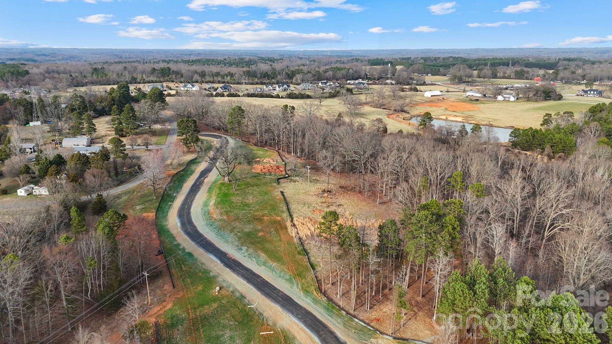 5700 Bentley Ridge Drive, Unit 12 Davidson, NC 28036 - Photo 18 of 25 a view of a lake