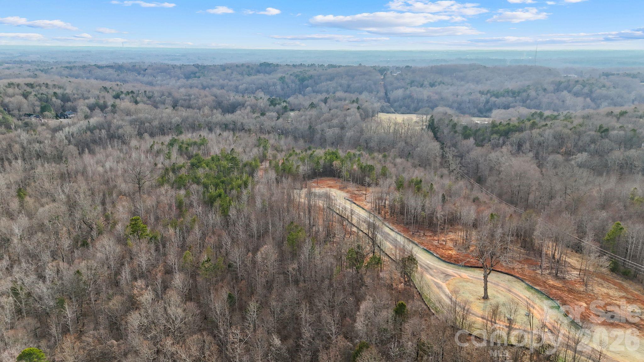 5700 Bentley Ridge Drive, Unit 12 Davidson, NC 28036 - Photo 20 of 25 a view of a yard with an outdoor space