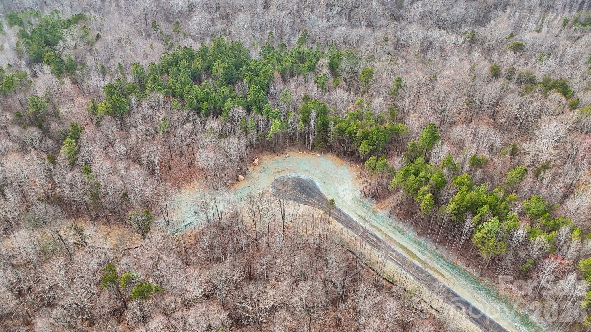 5700 Bentley Ridge Drive, Unit 12 Davidson, NC 28036 - Photo 22 of 25 a view of a yard