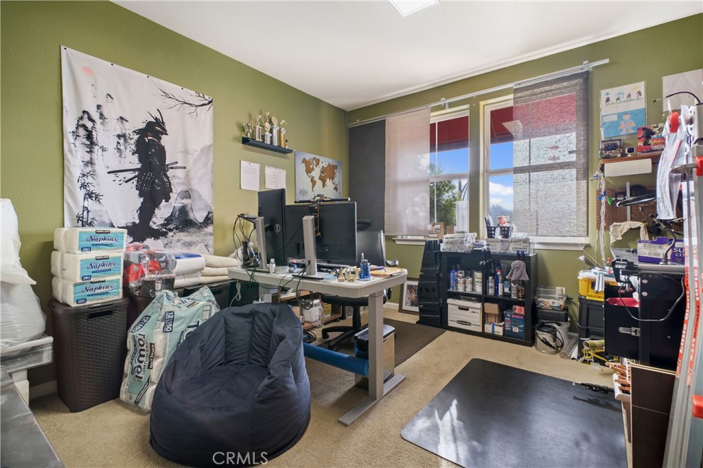 1390 Saddle Rack Street, Unit 308 San Jose, CA 95126 - Photo 13 of 32 a view of a workspace with furniture and a window