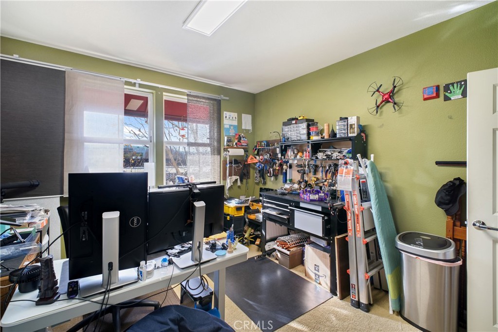 1390 Saddle Rack Street, Unit 308 San Jose, CA 95126 - Photo 14 of 32 a view of a room with gym equipment