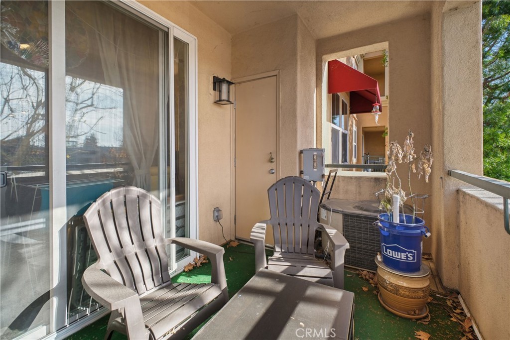 1390 Saddle Rack Street, Unit 308 San Jose, CA 95126 - Photo 24 of 32 a room with furniture and windows