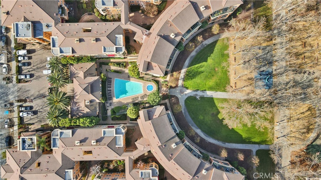 1390 Saddle Rack Street, Unit 308 San Jose, CA 95126 - Photo 25 of 32 an aerial view of a residential houses with yard and parking