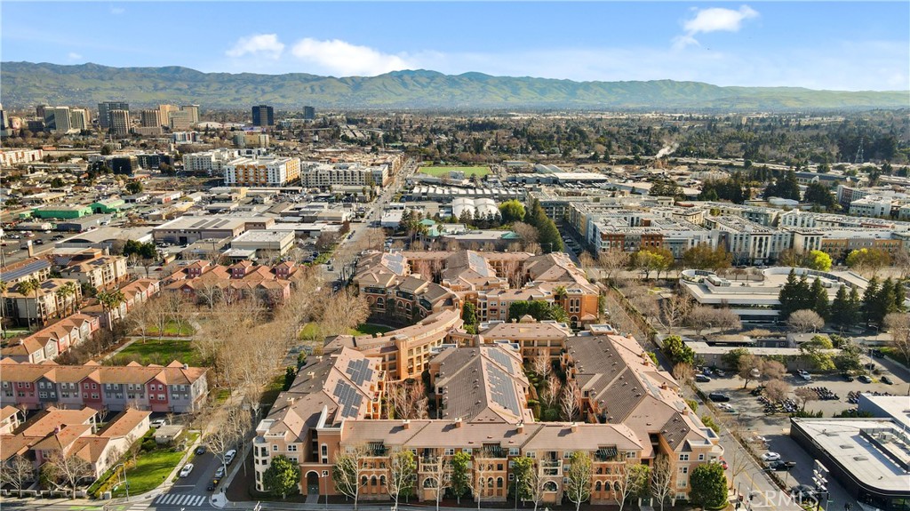 1390 Saddle Rack Street, Unit 308 San Jose, CA 95126 - Photo 31 of 32 an aerial view of residential building with parking