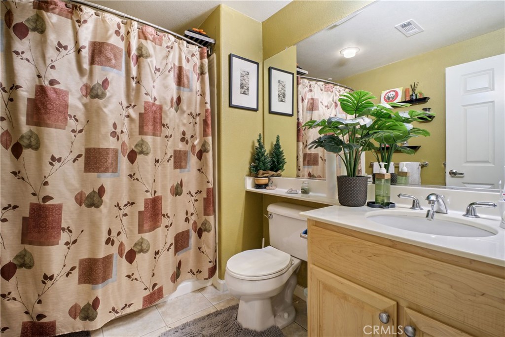 1390 Saddle Rack Street, Unit 308 San Jose, CA 95126 - Photo 10 of 32 a bathroom with a sink toilet and shower
