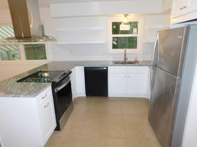 1710 Pine Road Marietta, GA 30062 - Photo 7 of 23 a kitchen with granite countertop stainless steel appliances a refrigerator stove top oven and sink