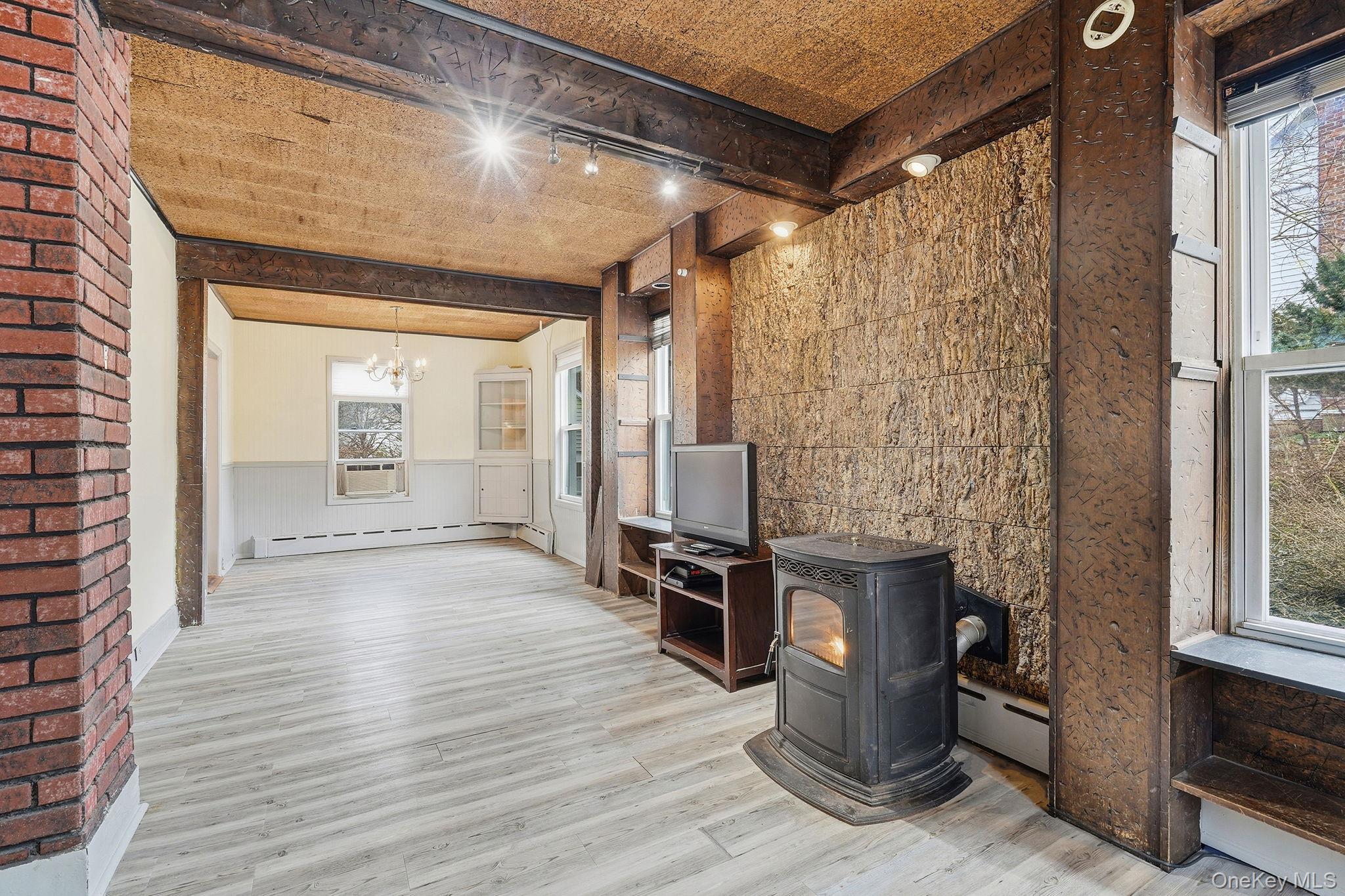 33 Mountain Road Irvington, NY 10533 - Photo 10 of 38 Living room with Pellet Stove