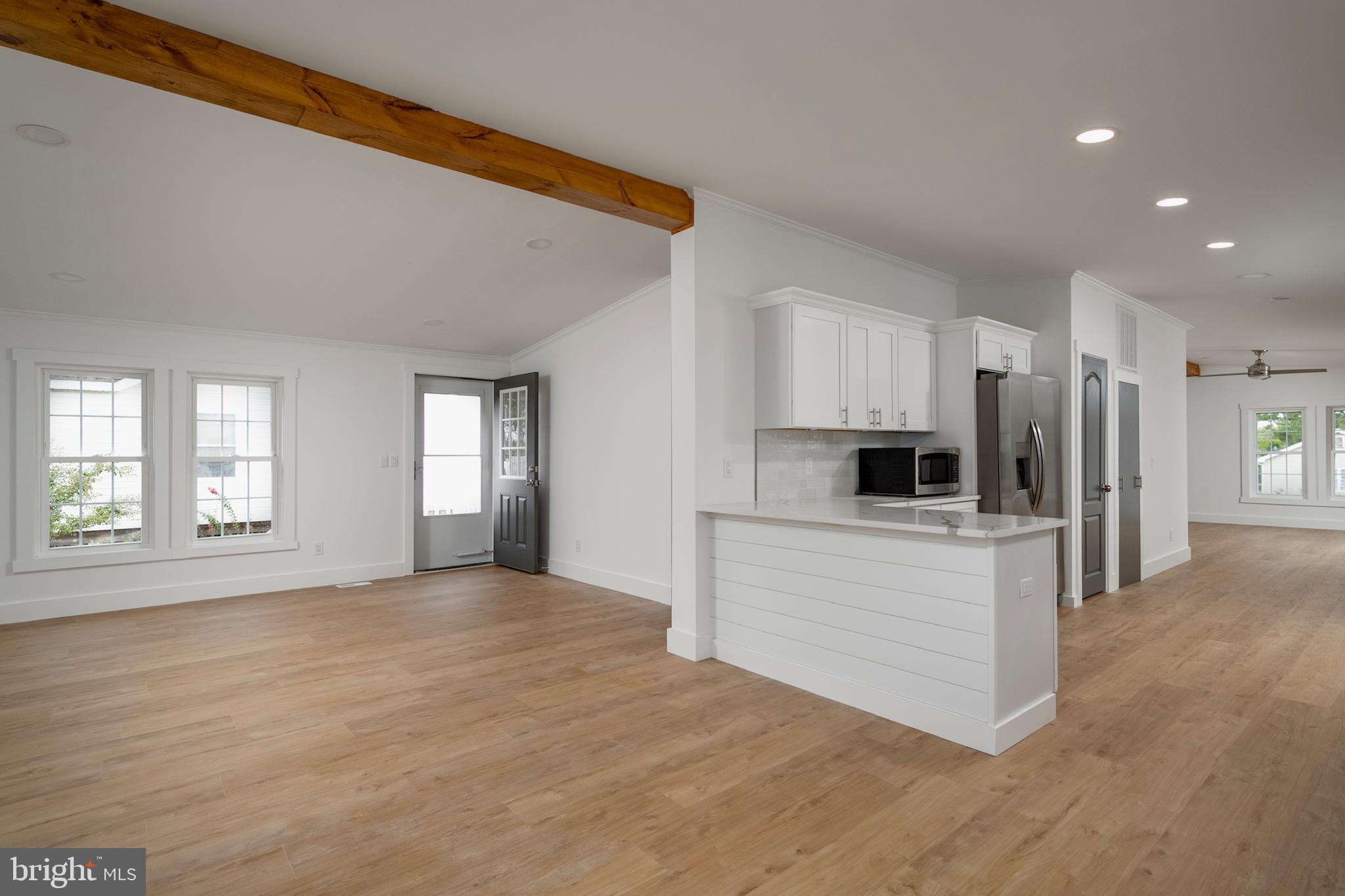 12403 Salisbury Road Ocean City, MD 21842 - Photo 13 of 28 a view of kitchen and front door