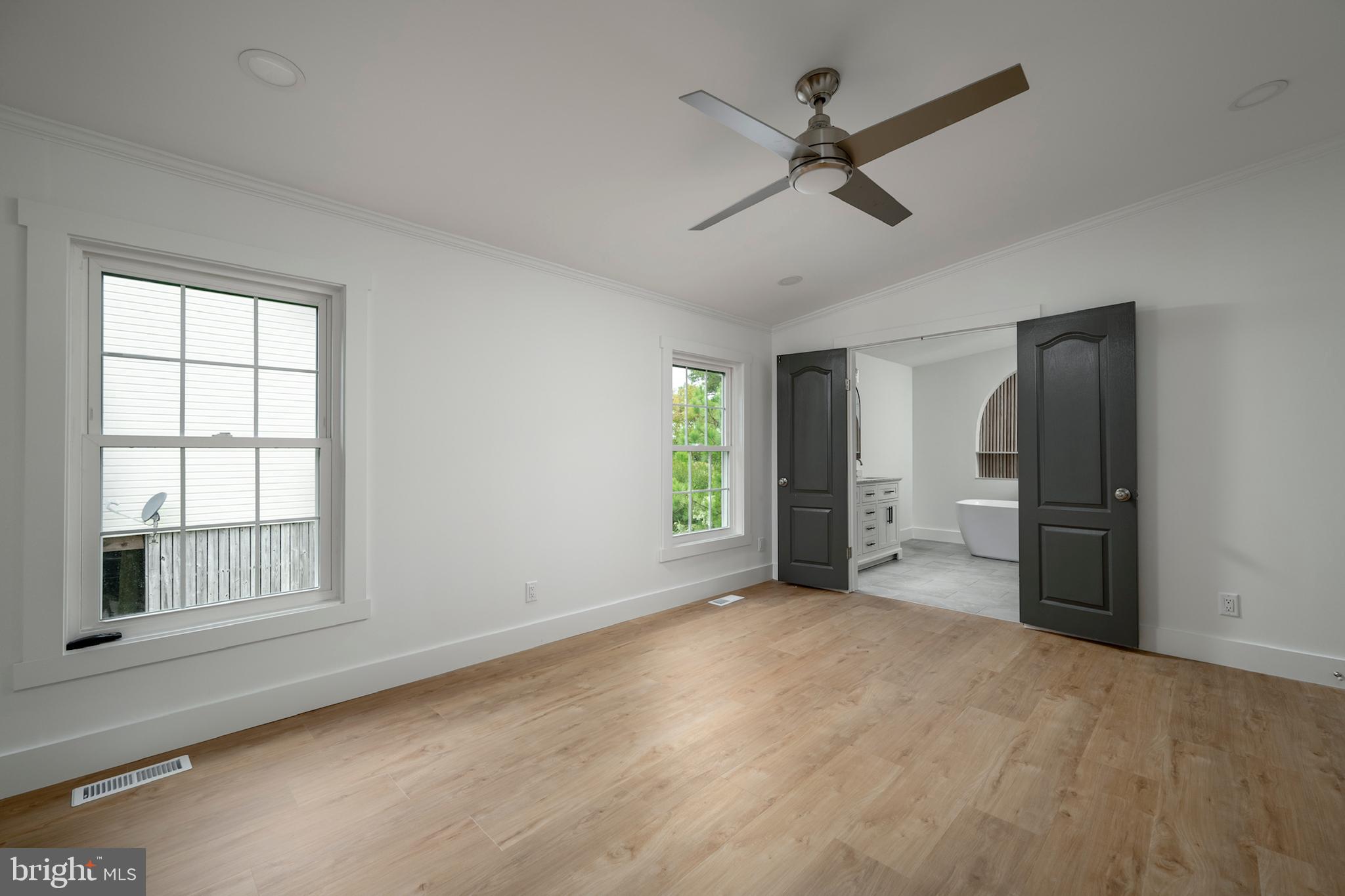 12403 Salisbury Road Ocean City, MD 21842 - Photo 21 of 28 a view of a livingroom with a ceiling fan and window