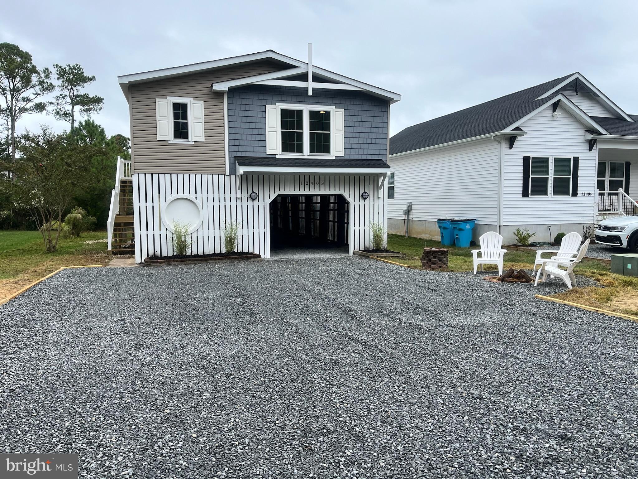 12403 Salisbury Road Ocean City, MD 21842 - Photo 4 of 28 a view of a house with backyard and sitting area