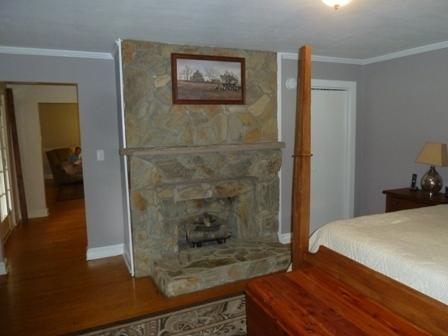 1709 6 Mile Post Road Callaway, VA 24067 - Photo 14 of 36 a bedroom with a bed and a mirror