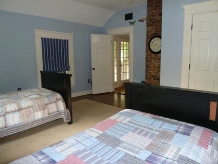 1709 6 Mile Post Road Callaway, VA 24067 - Photo 18 of 36 a bedroom with a bed and a window