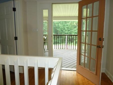 1709 6 Mile Post Road Callaway, VA 24067 - Photo 22 of 36 a view of a porch with wooden floor