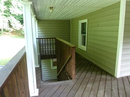 1709 6 Mile Post Road Callaway, VA 24067 - Photo 25 of 36 a view of balcony and wooden floor