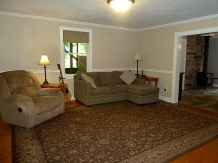 1709 6 Mile Post Road Callaway, VA 24067 - Photo 4 of 36 a living room with furniture and a window