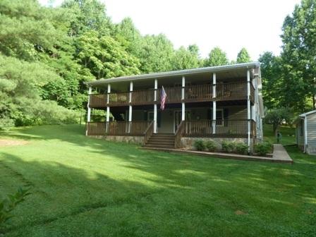 1709 6 Mile Post Road Callaway, VA 24067 - Photo 36 of 36 a view of an house with backyard space and balcony