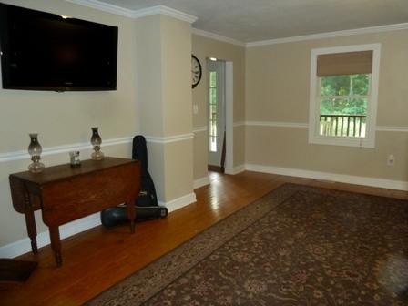 1709 6 Mile Post Road Callaway, VA 24067 - Photo 5 of 36 a room with furniture and a flat screen tv
