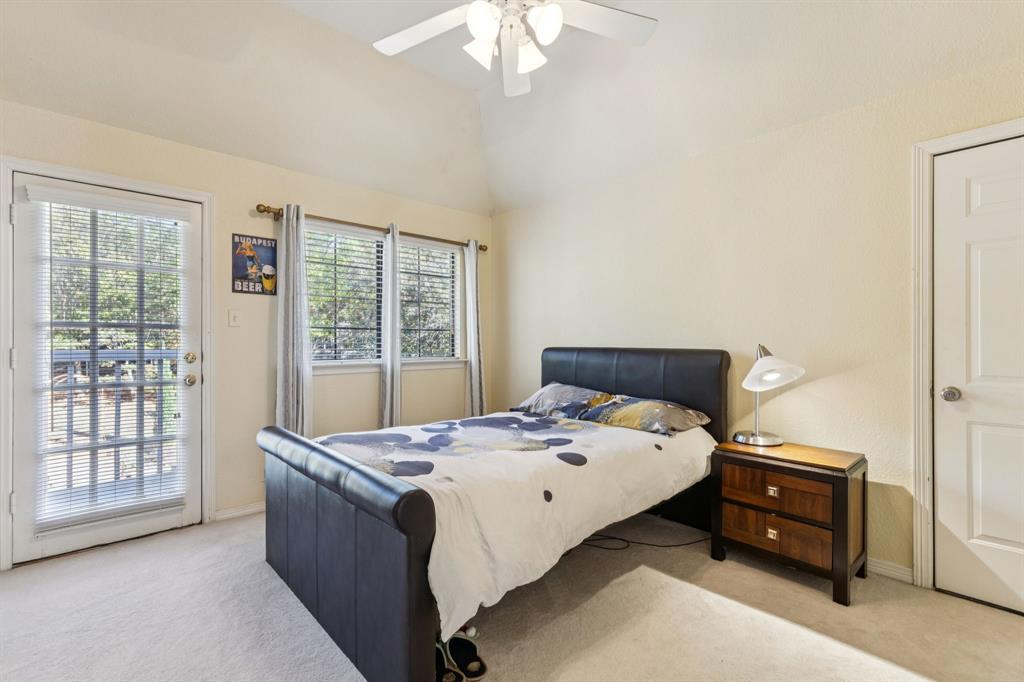 3825 Montecito Drive Denton, TX 76205 - Photo 27 of 37 a bedroom with a bed and a window