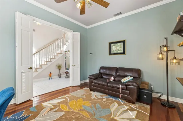 a living room with furniture and a rug