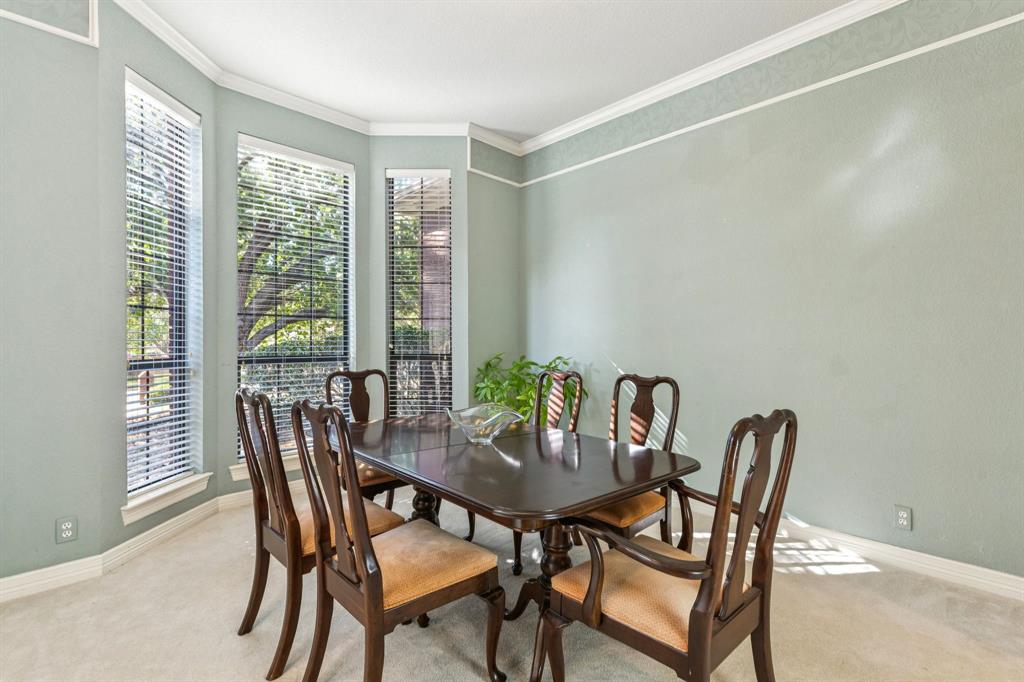 3825 Montecito Drive Denton, TX 76205 - Photo 8 of 37 a view of a dining room with furniture window and outside view