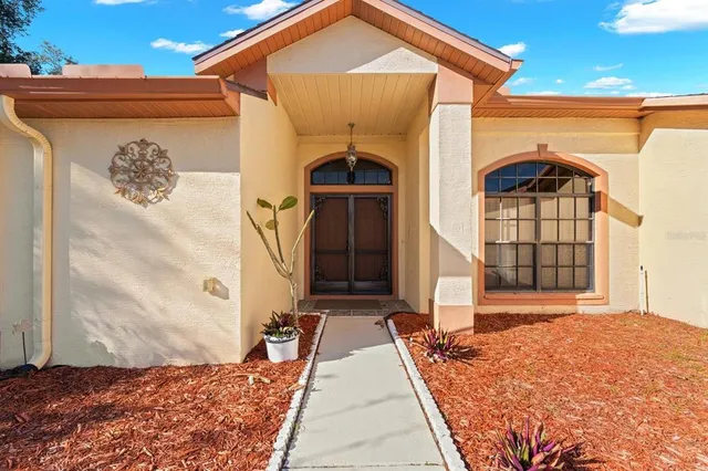a front view of a house with a door