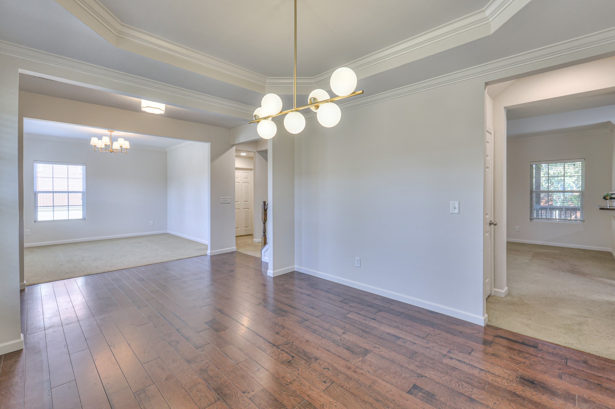 3104 Rutgers Pass Nolensville, TN 37135 - Photo 11 of 66 a view of an empty room with wooden floor and a window
