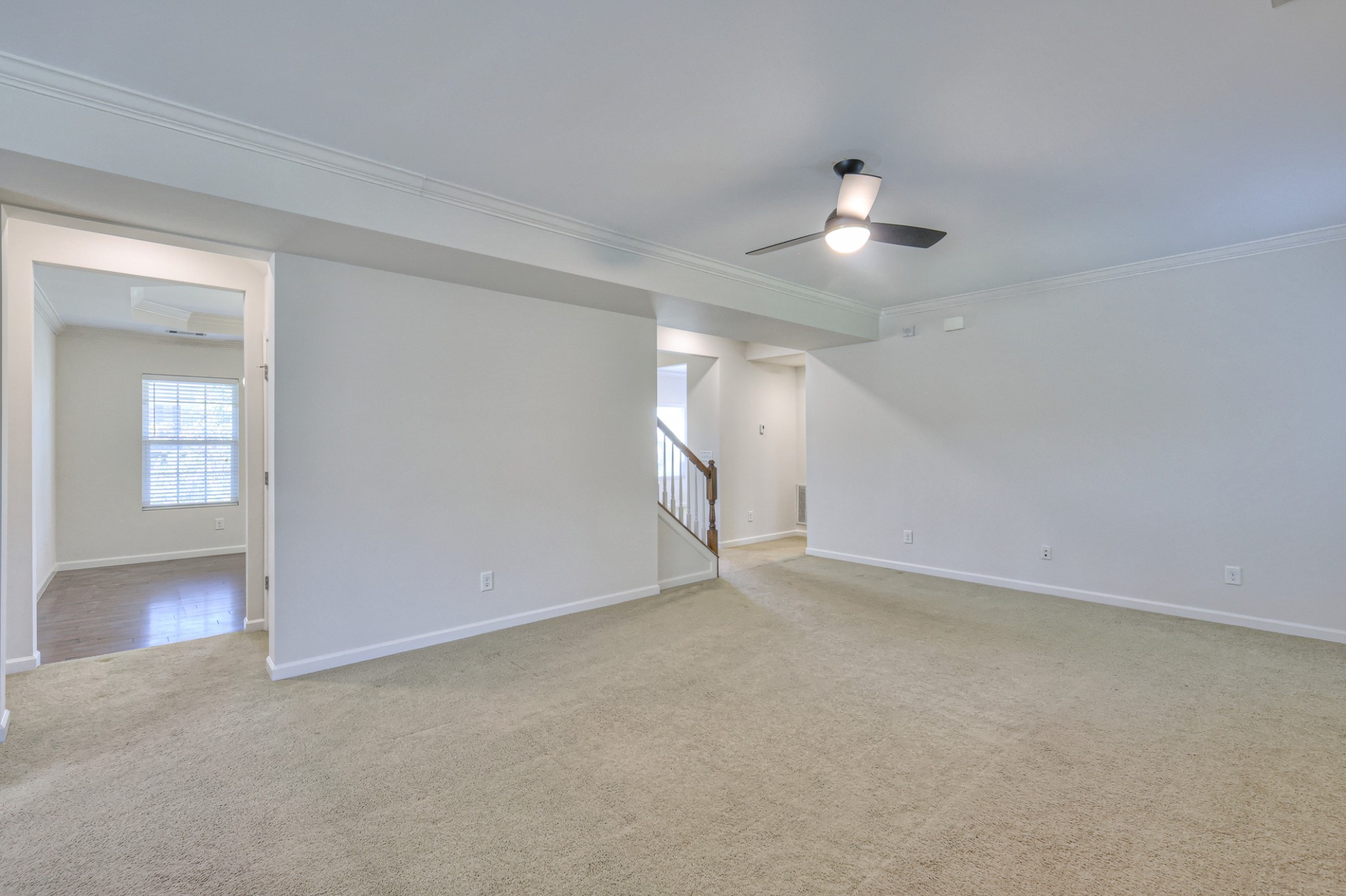 3104 Rutgers Pass Nolensville, TN 37135 - Photo 17 of 66 wooden floor in an empty room with a ceiling fan