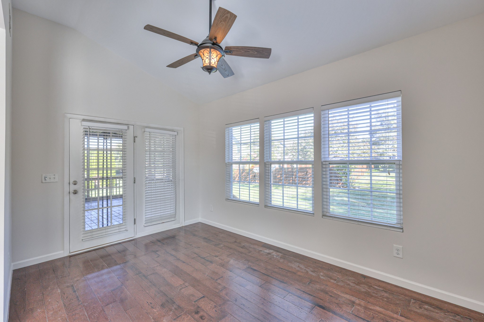 3104 Rutgers Pass Nolensville, TN 37135 - Photo 27 of 66 a view of an empty room with a window and wooden floor