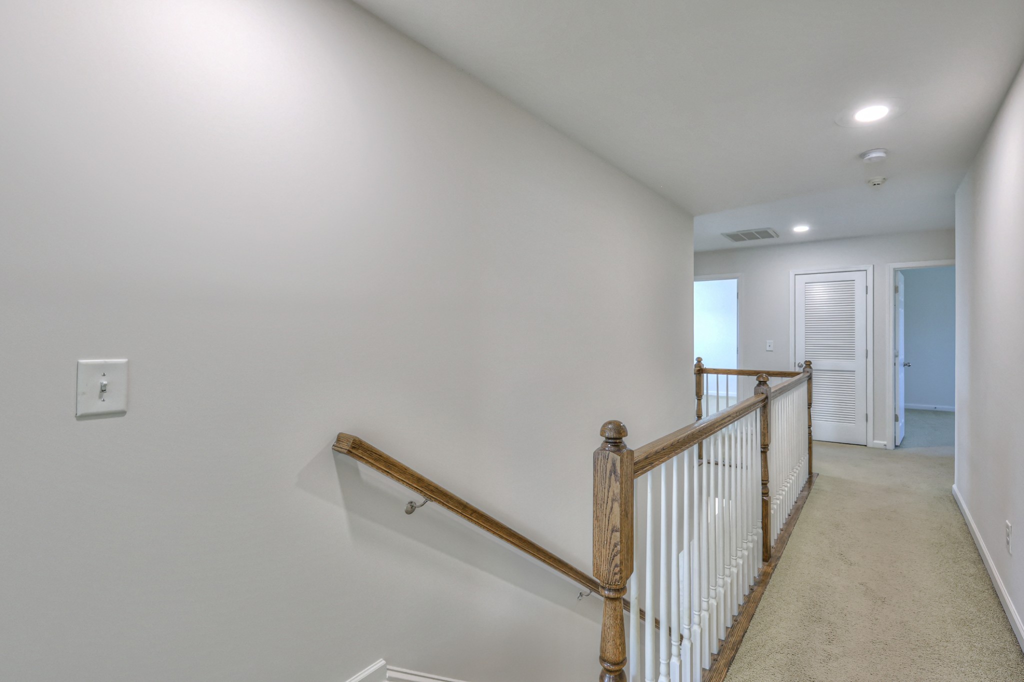 3104 Rutgers Pass Nolensville, TN 37135 - Photo 32 of 66 a view of a hallway with wooden floor