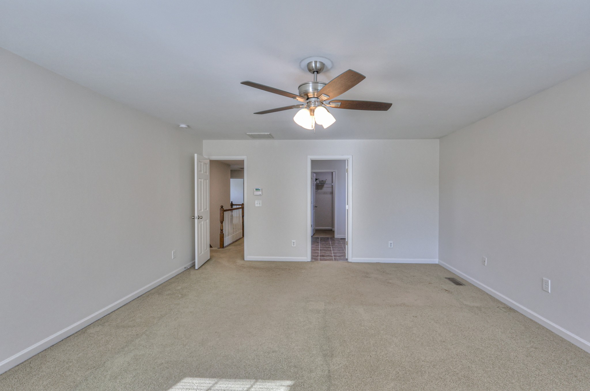 3104 Rutgers Pass Nolensville, TN 37135 - Photo 35 of 66 a view of an empty room with a ceiling fan