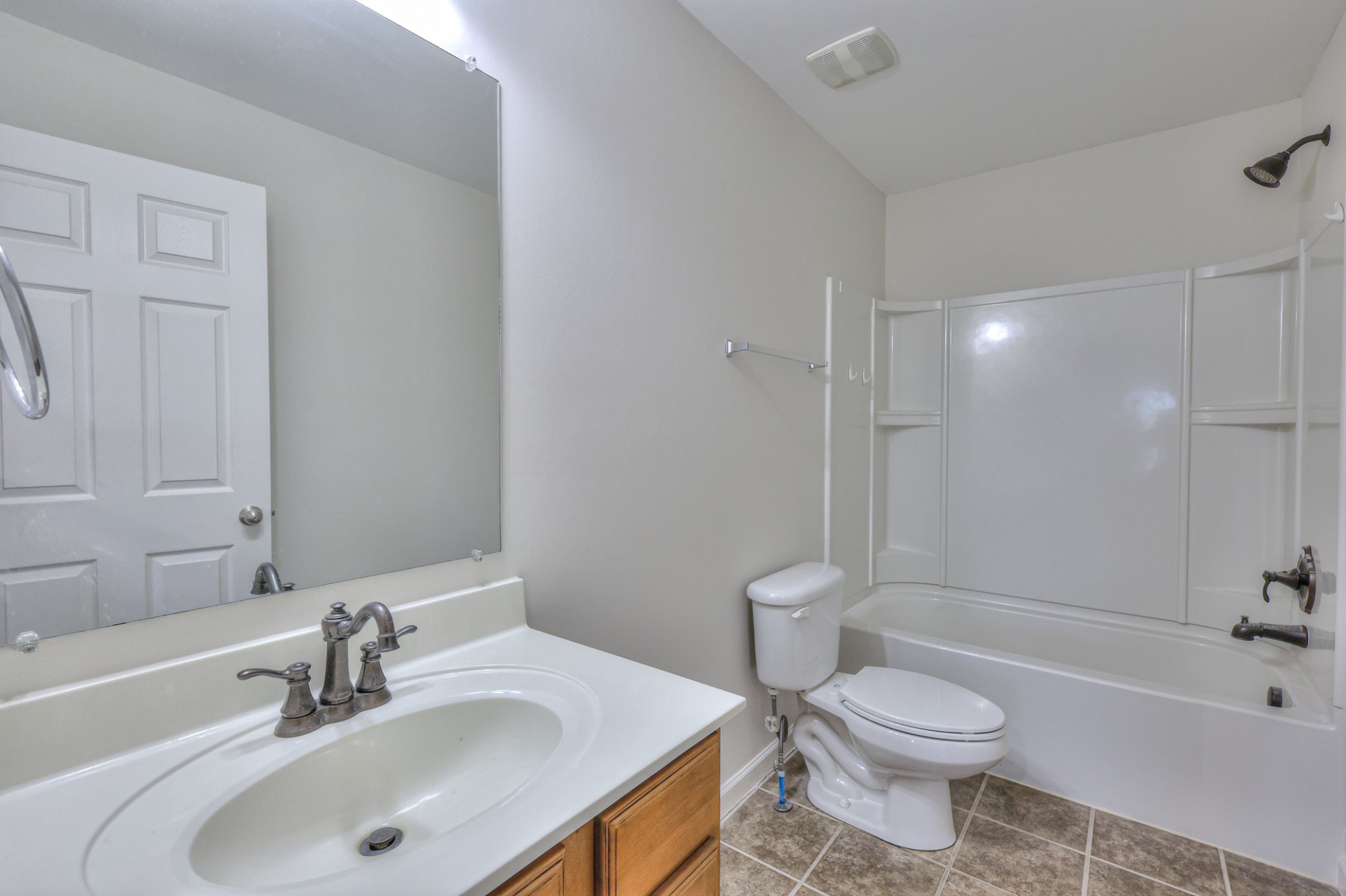 3104 Rutgers Pass Nolensville, TN 37135 - Photo 43 of 66 a bathroom with a toilet a sink a mirror and bathtub