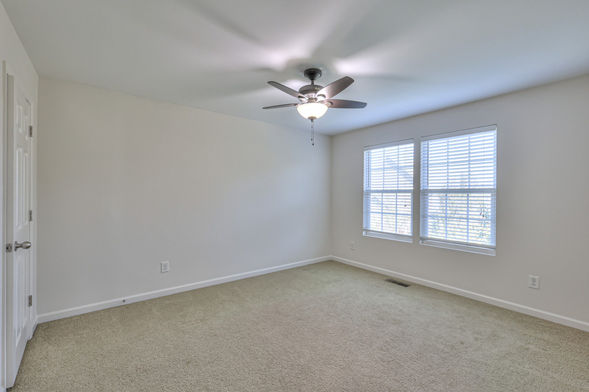 3104 Rutgers Pass Nolensville, TN 37135 - Photo 45 of 66 an empty room with a window and a fan