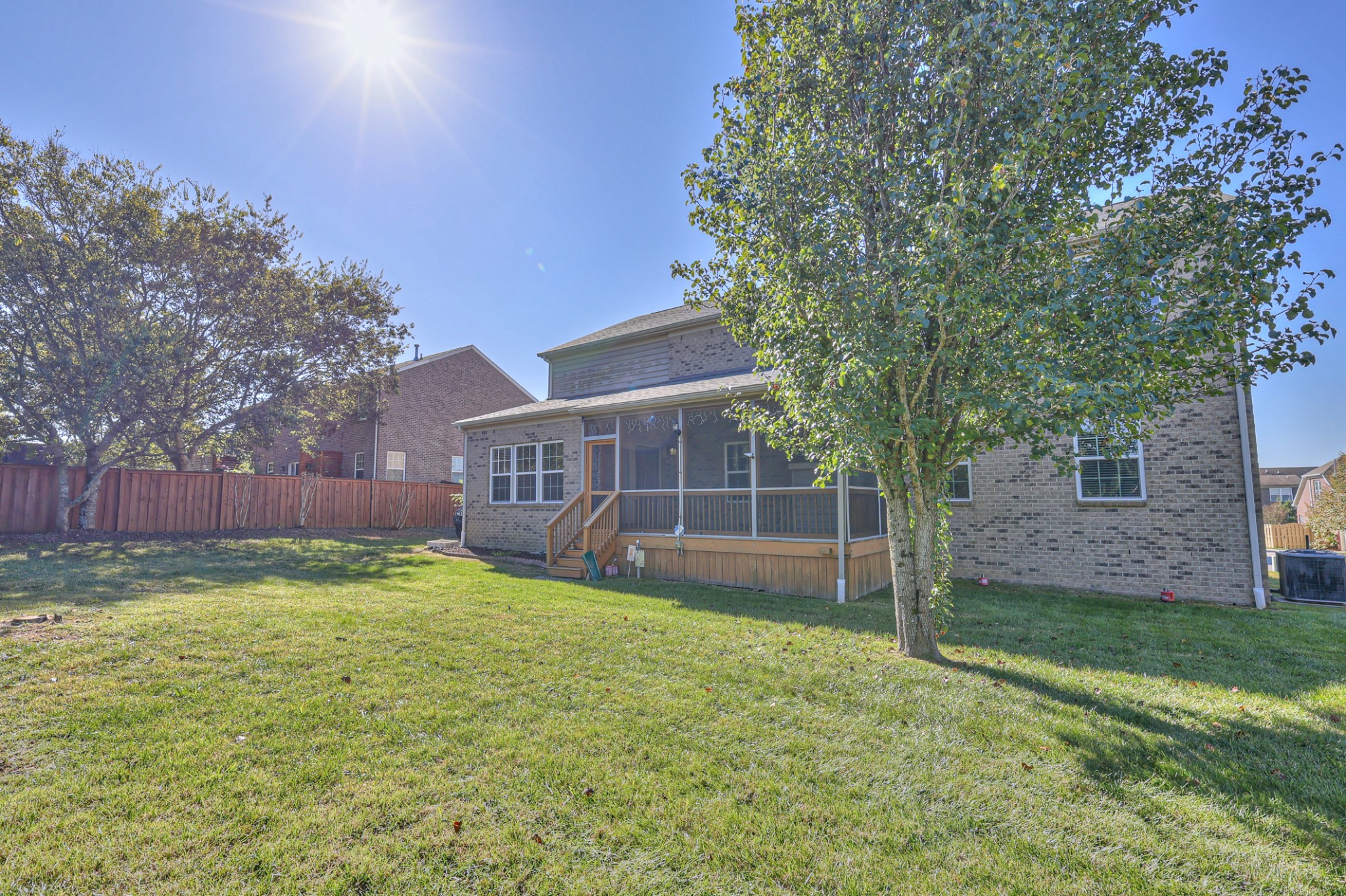 3104 Rutgers Pass Nolensville, TN 37135 - Photo 60 of 66 a view of a yard in front of a house with large trees