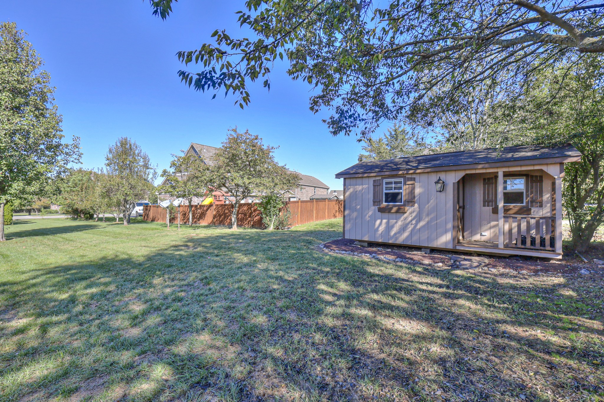 3104 Rutgers Pass Nolensville, TN 37135 - Photo 63 of 66 a view of a house with backyard and tree