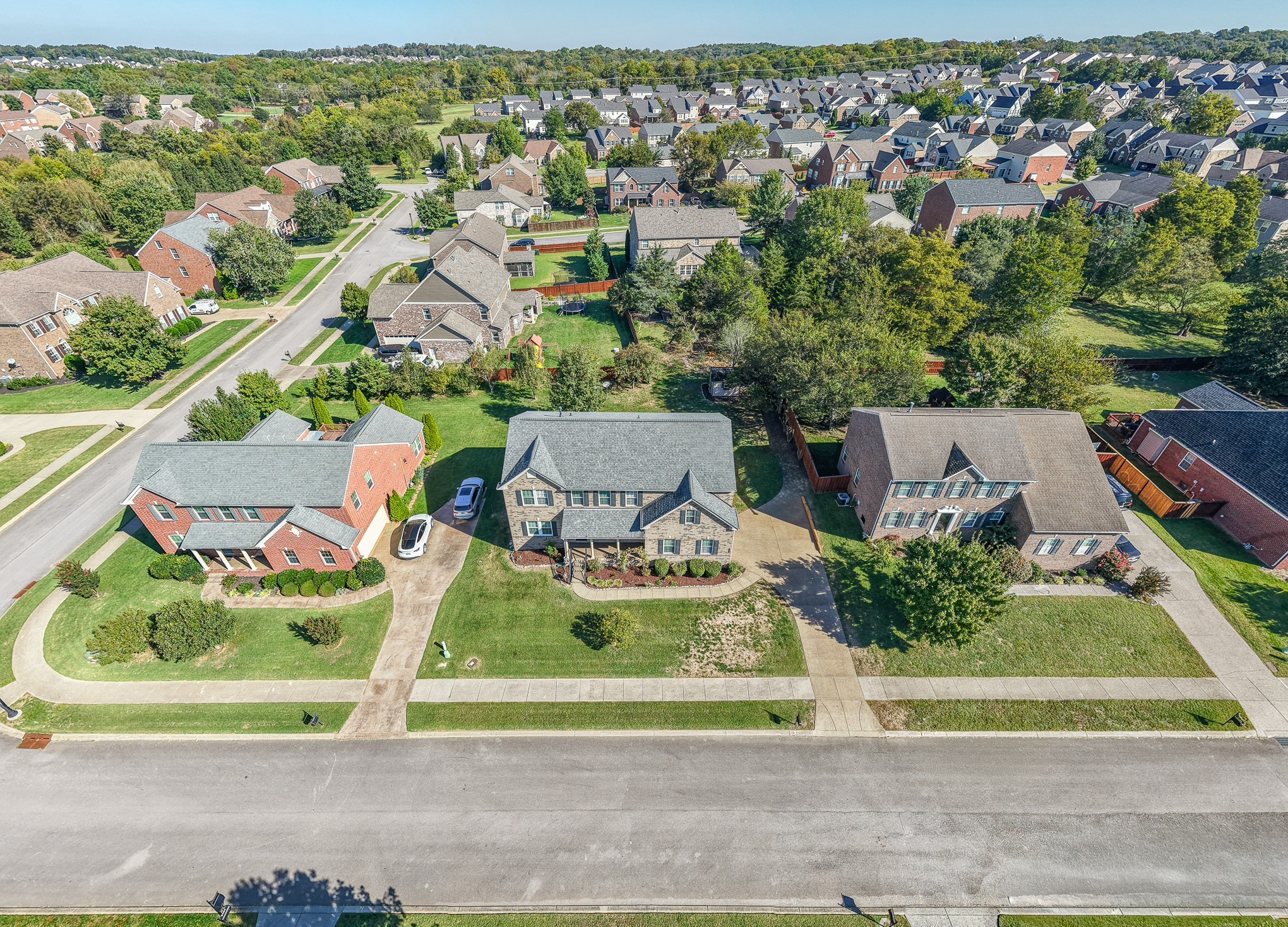 3104 Rutgers Pass Nolensville, TN 37135 - Photo 64 of 66 an aerial view of residential houses with outdoor space and parking