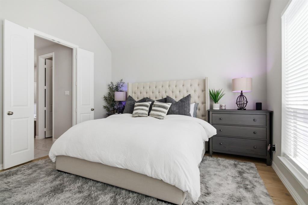 910 Winter Cherry Lane Haslet, TX 76052 - Photo 20 of 40 a bedroom with a bed and window