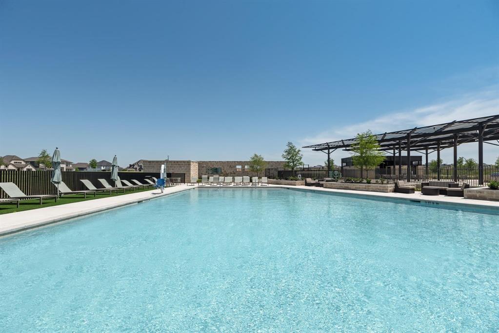 910 Winter Cherry Lane Haslet, TX 76052 - Photo 38 of 40 a view of a swimming pool and outdoor space