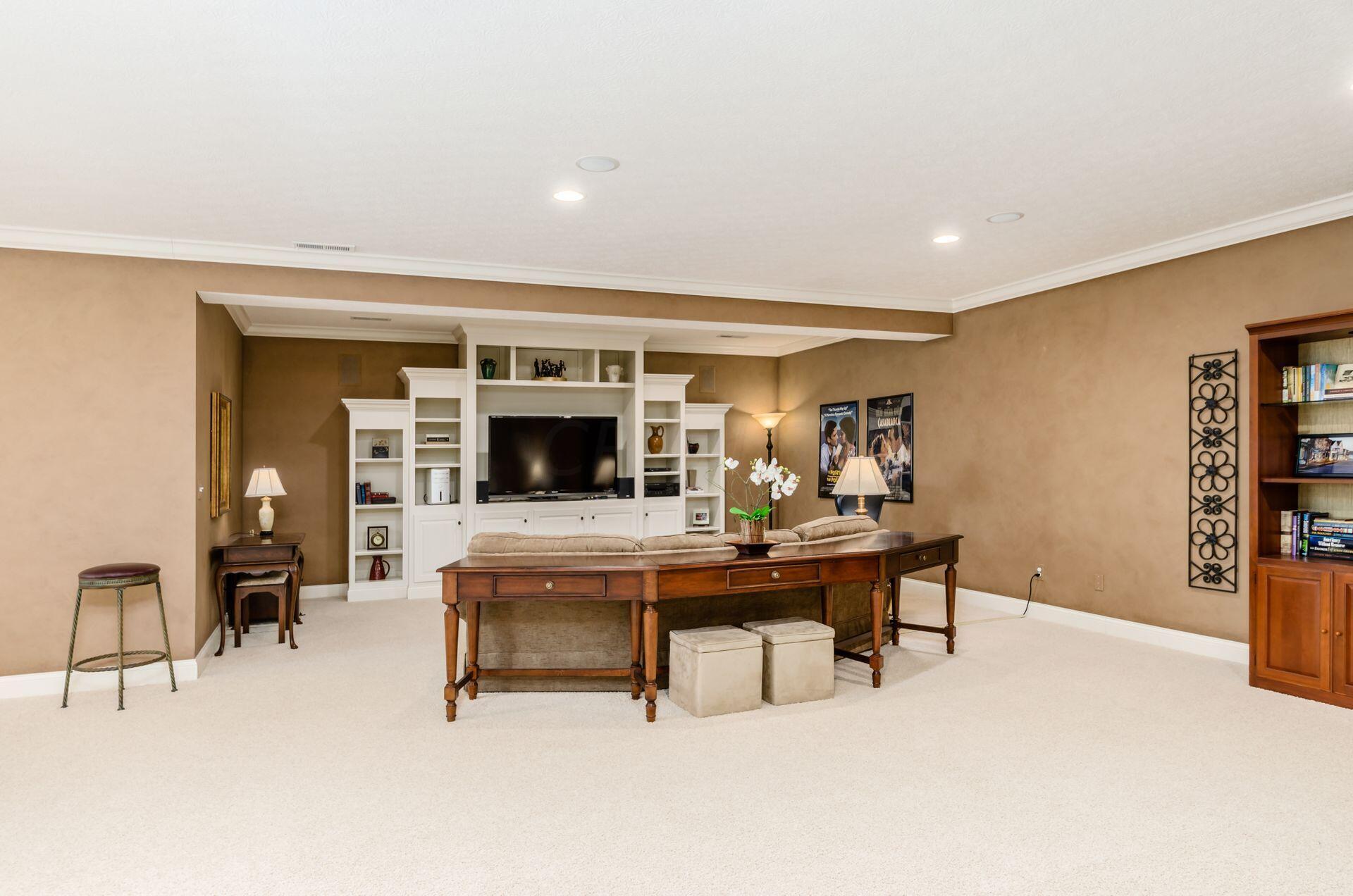 5410 Slater Ridge Westerville, OH 43082 - Photo 65 of 78 Finished lower level media area with custom built-ins.