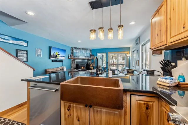 a room with lots of counter space and a dining table