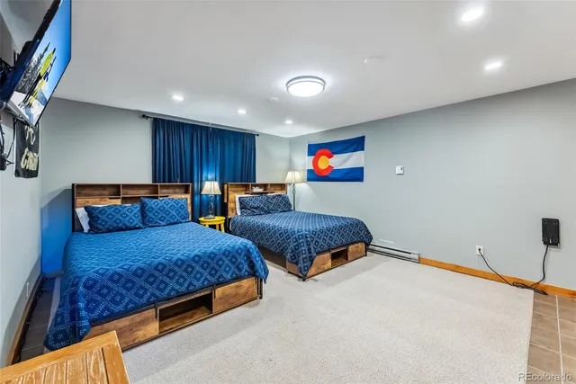 a bedroom with bed and window