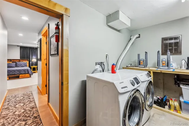 a view of hallway with washer and dryer