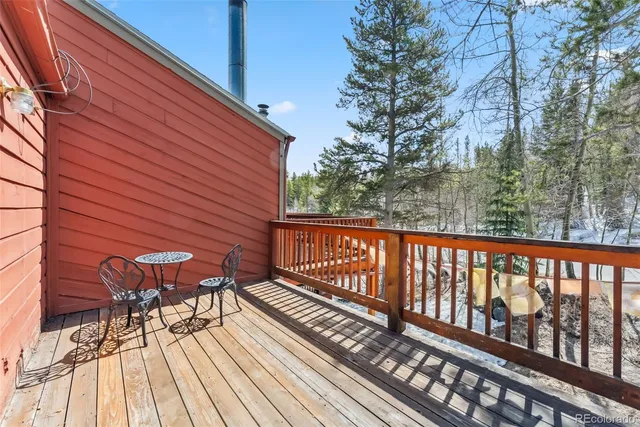 a view of a park with iron fence