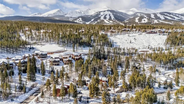a view of a city with mountains