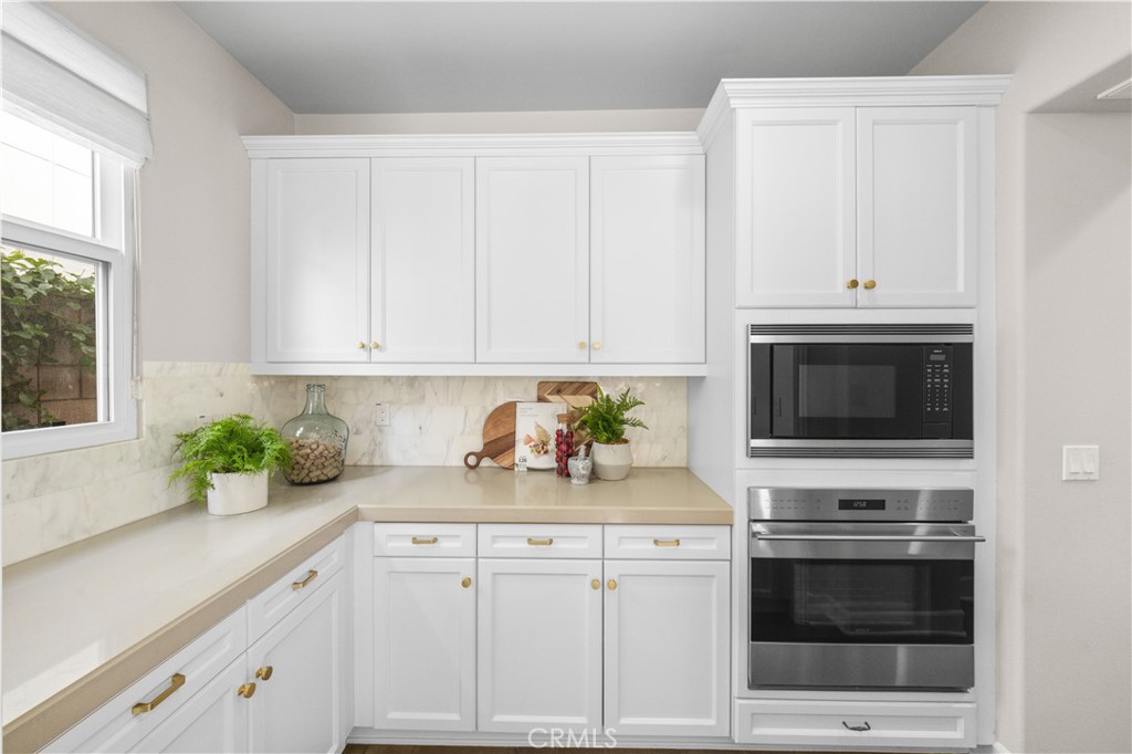 71 Clocktower Irvine, CA 92620 - Photo 17 of 59 Preparation area with built-in oven&mircowave